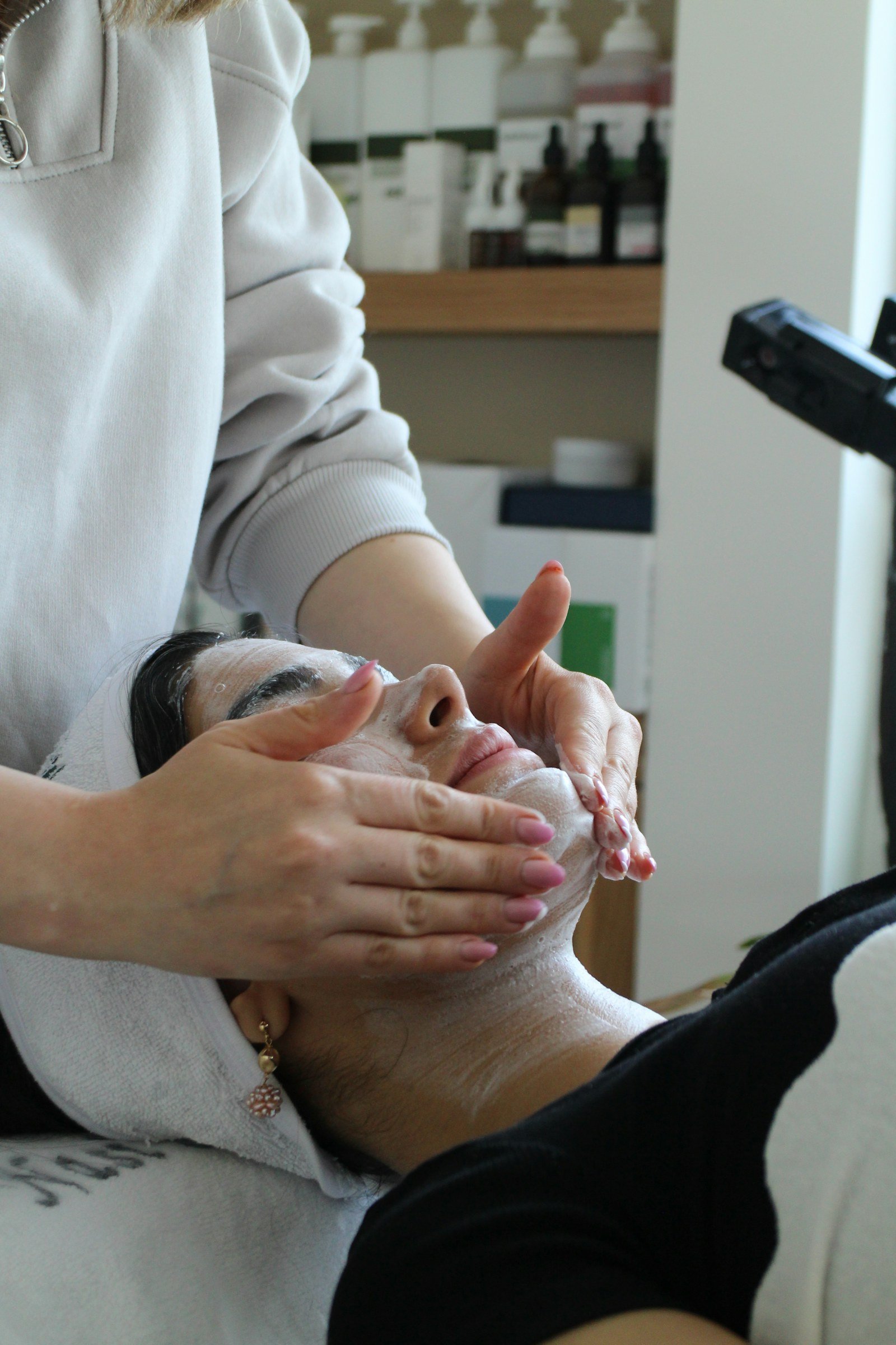 Clinician performing a skin treatment Clinician performing a skin treatment